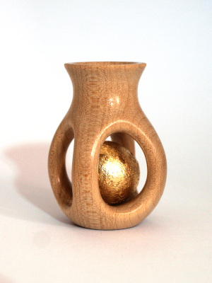 Vase Containing Golden Ball